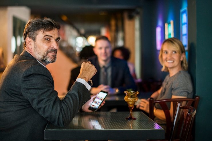 login pisangbet mobile app interface on Android phone showing live-dealer table selection